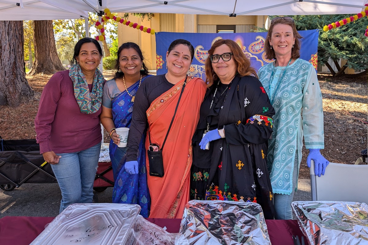 volunteers at food table