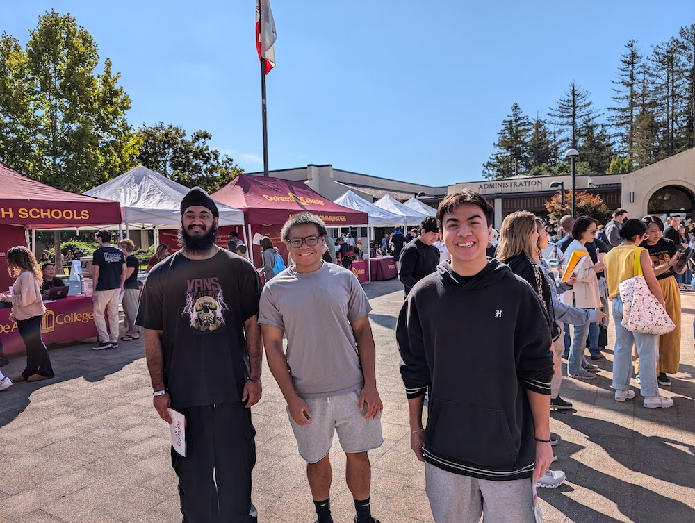 three young men in main quad