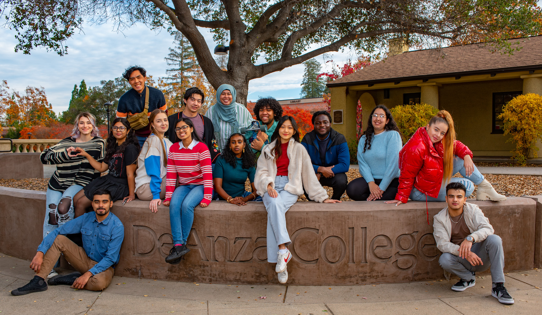 Students in front of De Anza sign